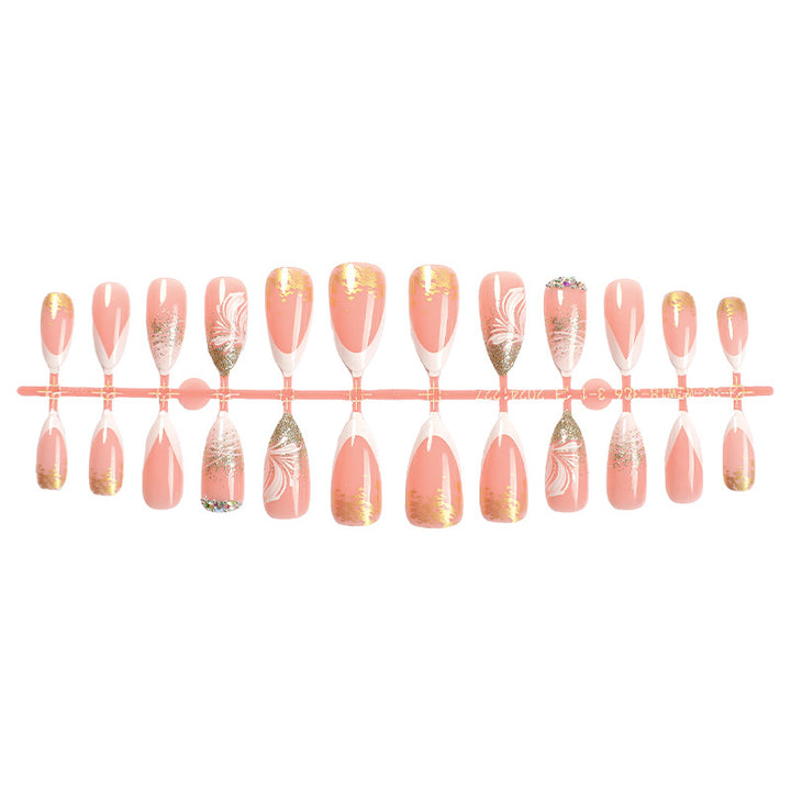 Artificial nail set with glamorous floral and glitter decorations Bowlift