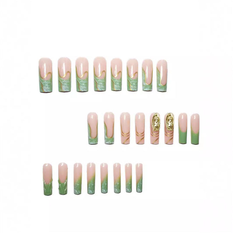 Artistic Press-On Nail Extensions with Gold Detailing Bowlift