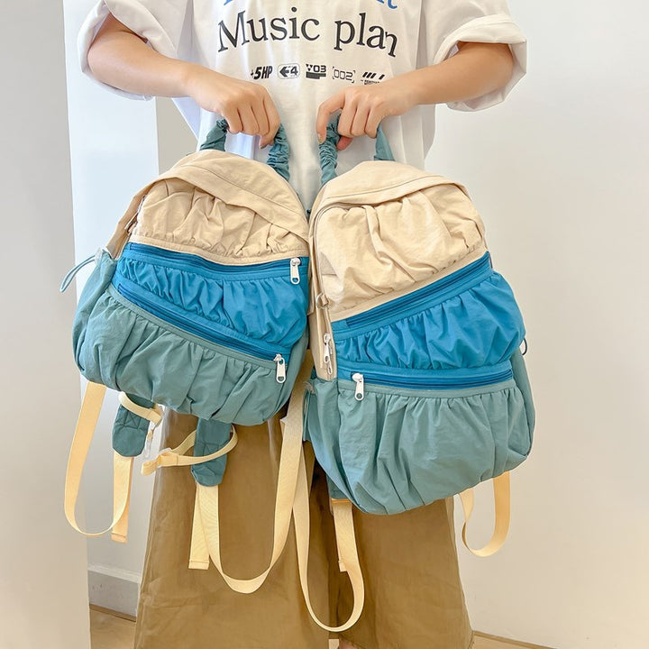 Backpack with Innovative, Versatile Compartment System and Elastic Design Bowlift