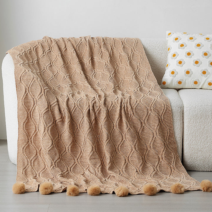 Ladies knit blanket with decorative pom poms Bowlift