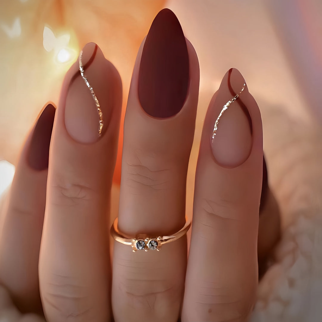 Artistic Press-On Nail Set with Luxe Metallic Accents Bowlift