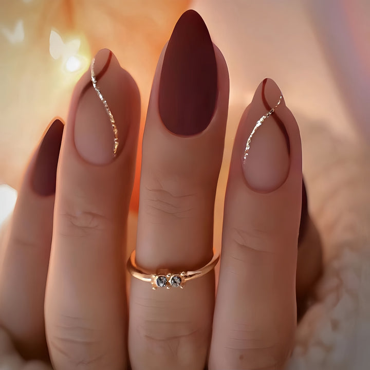Artistic Press-On Nail Set with Luxe Metallic Accents Bowlift