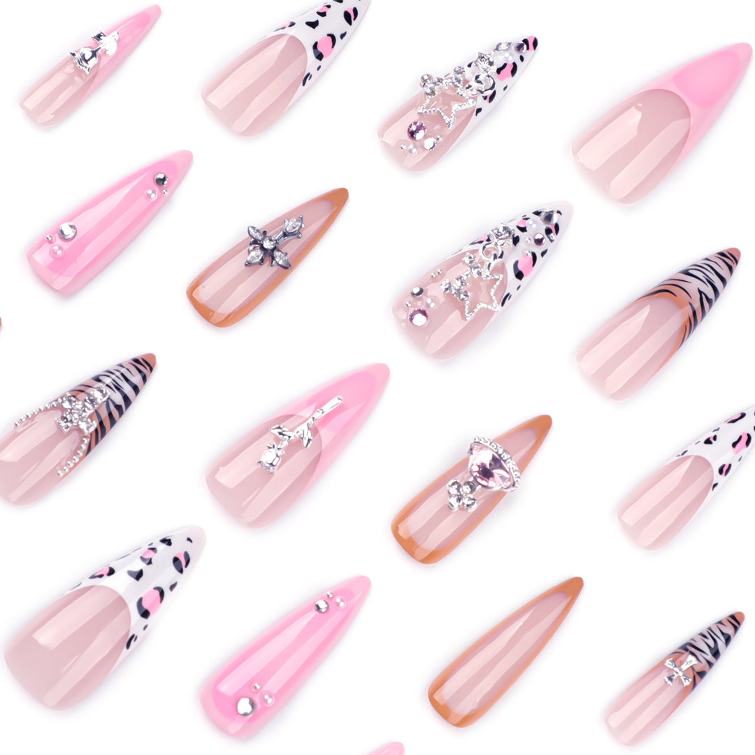 Artful stiletto nails with glitter and rhinestone embellishments Bowlift