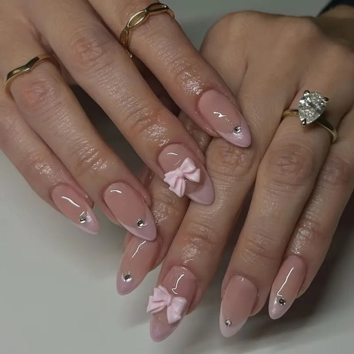 Glamorous nail art with bow detail Bowlift