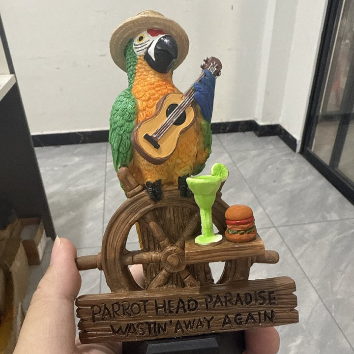 Decorative figure of a funny parrot with drink and guitar Bowlift