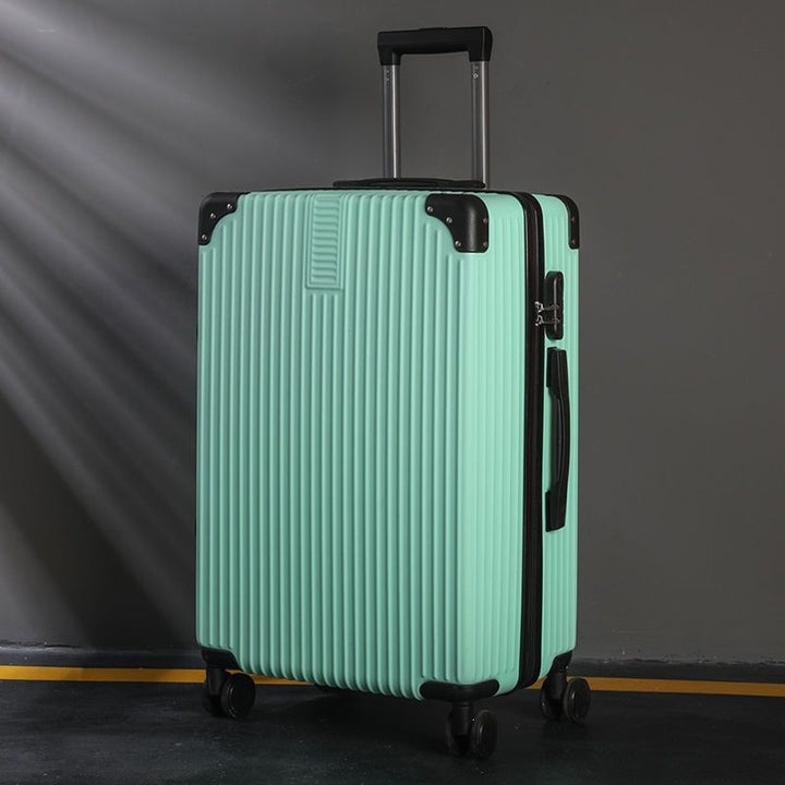 Hard shell suitcase with 360-degree wheel system and integrated safety feature Bowlift
