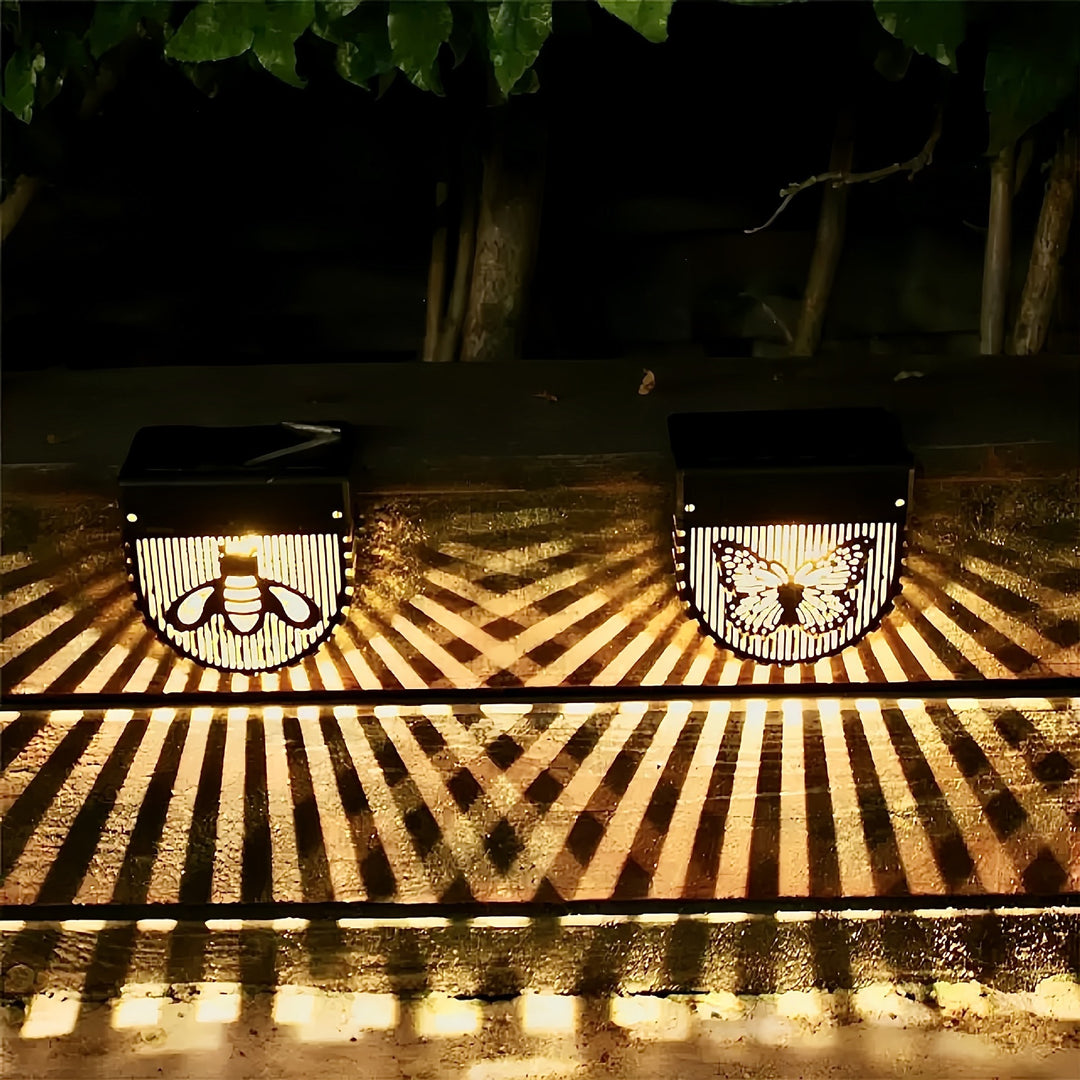 Decorative Solar-Powered Outdoor Wall Lanterns With Laser-Cut Insect And Floral Panels And Warm LED Ambiance Bowlift