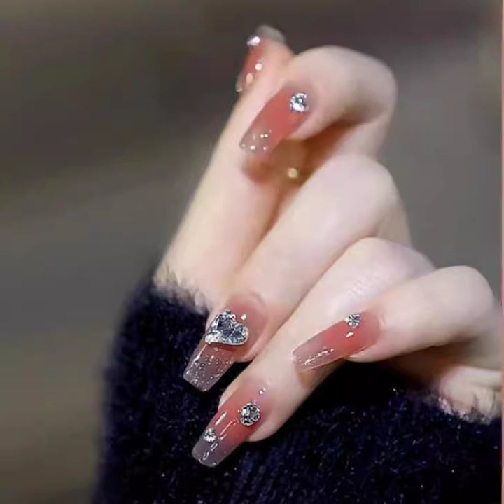 Elegant Nail Art with Glitter and Rhinestones Bowlift