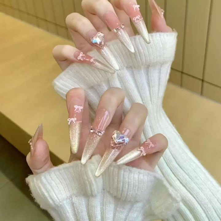 Glamorous artificial nail tips with elegant decorations Bowlift