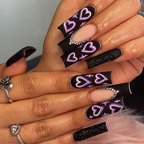 Artistic Heart-Embellished Nail Enhancements Bowlift