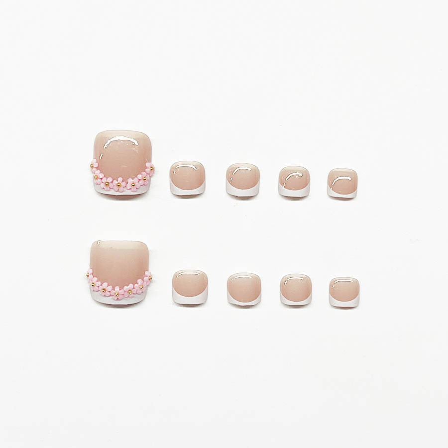 Nail art set with elegant French design and glamorous rhinestone accents Bowlift