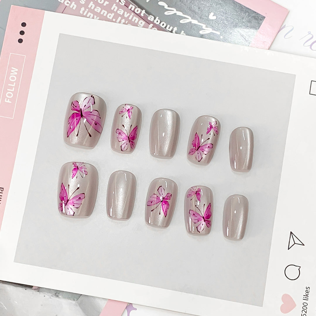 Artistic and elegant artificial nails with butterflies Bowlift