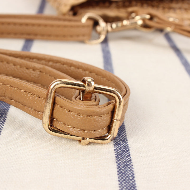 Shoulder bag made of braided straw with structured design Bowlift