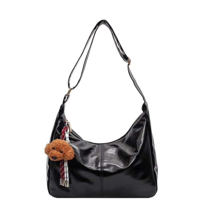 Shoulder bag with charming animal pendant Bowlift