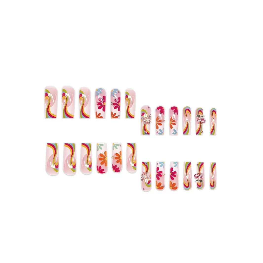 Artificial nails with colorful floral patterns and decorative accents Bowlift