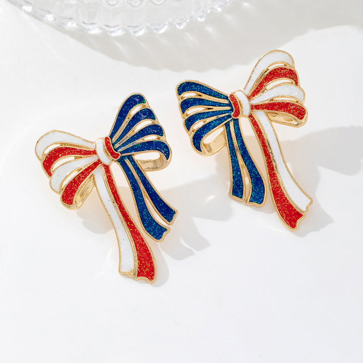 Ladies' elegant enamel bow earrings with glitter effect and gilded setting Bowlift
