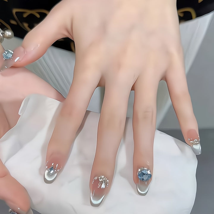 Glittering artificial nails with rhinestones Bowlift