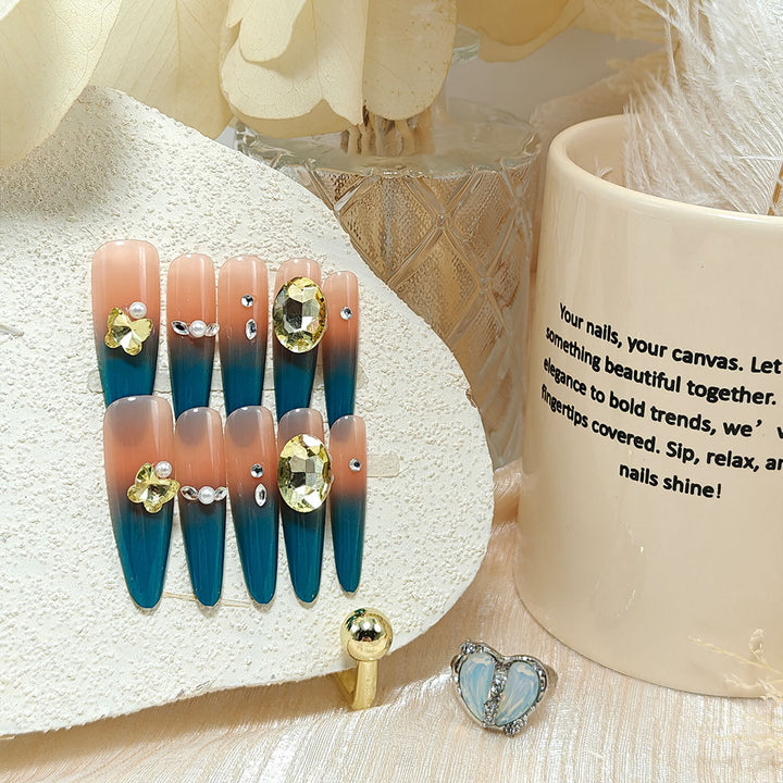 Glamorous artificial nails with elegant ombre effect and high-quality embellishments Bowlift
