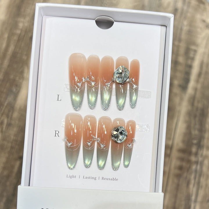 Elegant Stiletto Press-On Nail Art Set with Jewel Accents Bowlift