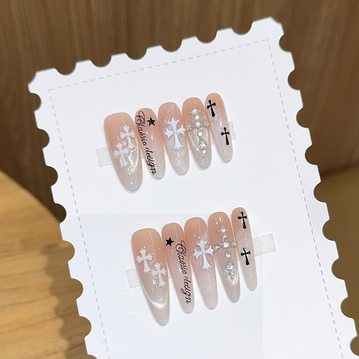 Artificial nail tips with cross and glitter motifs Bowlift