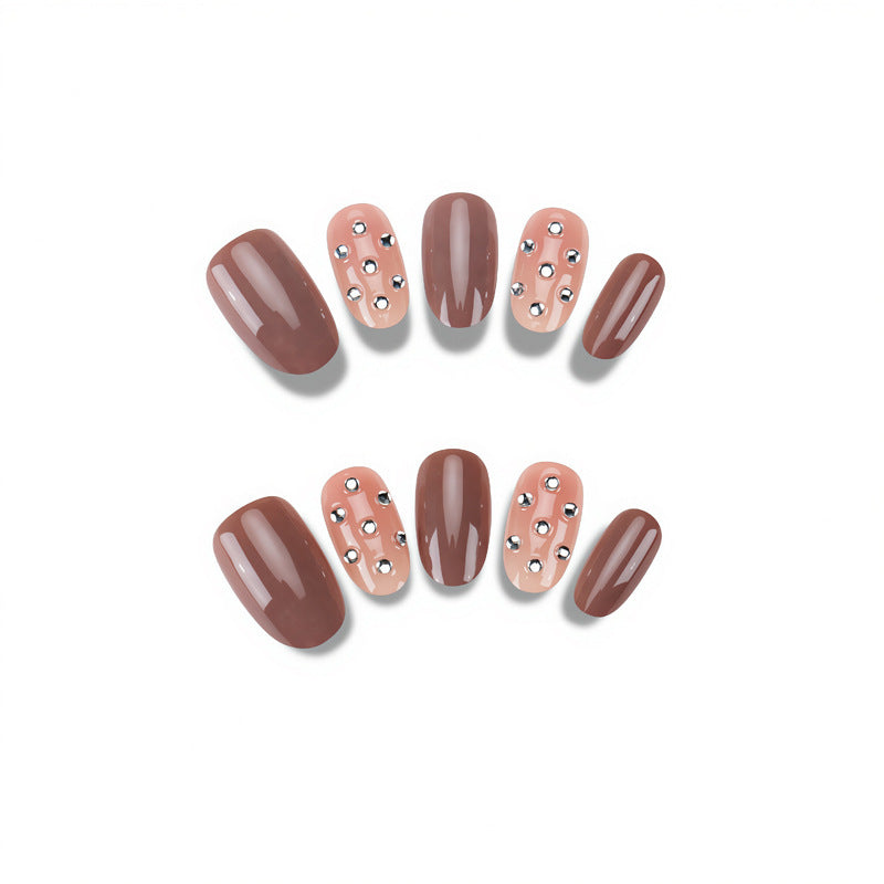 Elegant Nail Art with Rhinestone Accents Bowlift