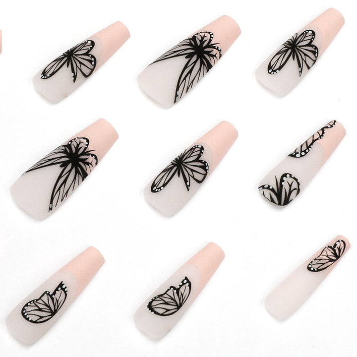 Artistic Nail Art with Butterfly Design Bowlift