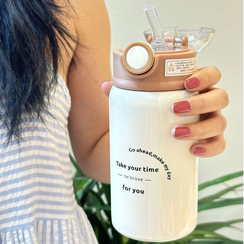 Women's insulated drinking bottle with innovative flip lid and practical handle Bowlift