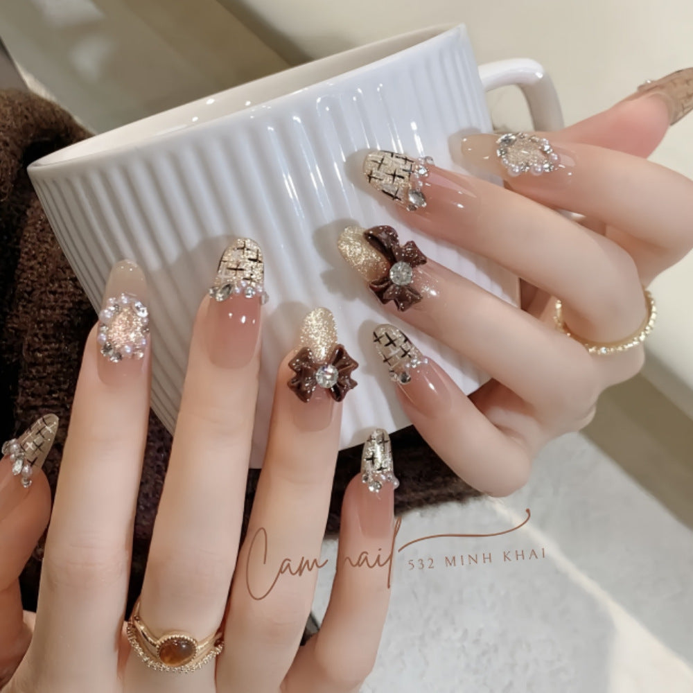 Artistic Press-On Nail Set with Floral and Gemstone Accents Bowlift
