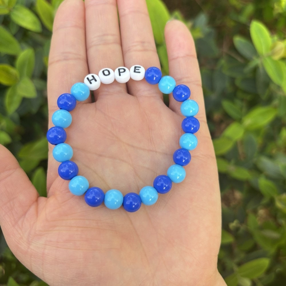Friendship bracelet made of pastel beads Bowlift