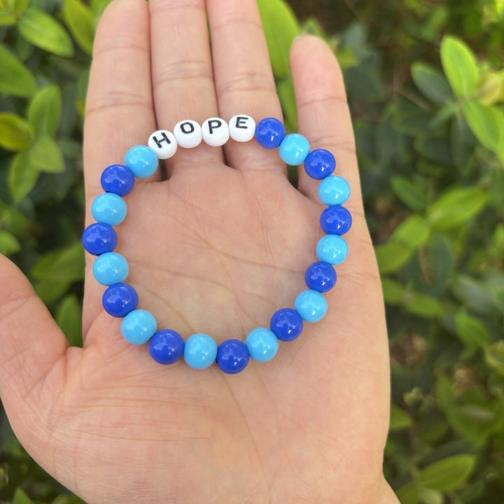 Friendship bracelet made of pastel beads Bowlift