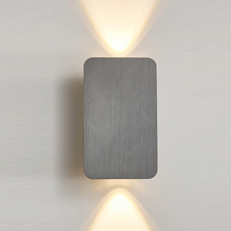 Modern rectangular LED wall sconce with dual up down beam and slim low-profile housing Bowlift
