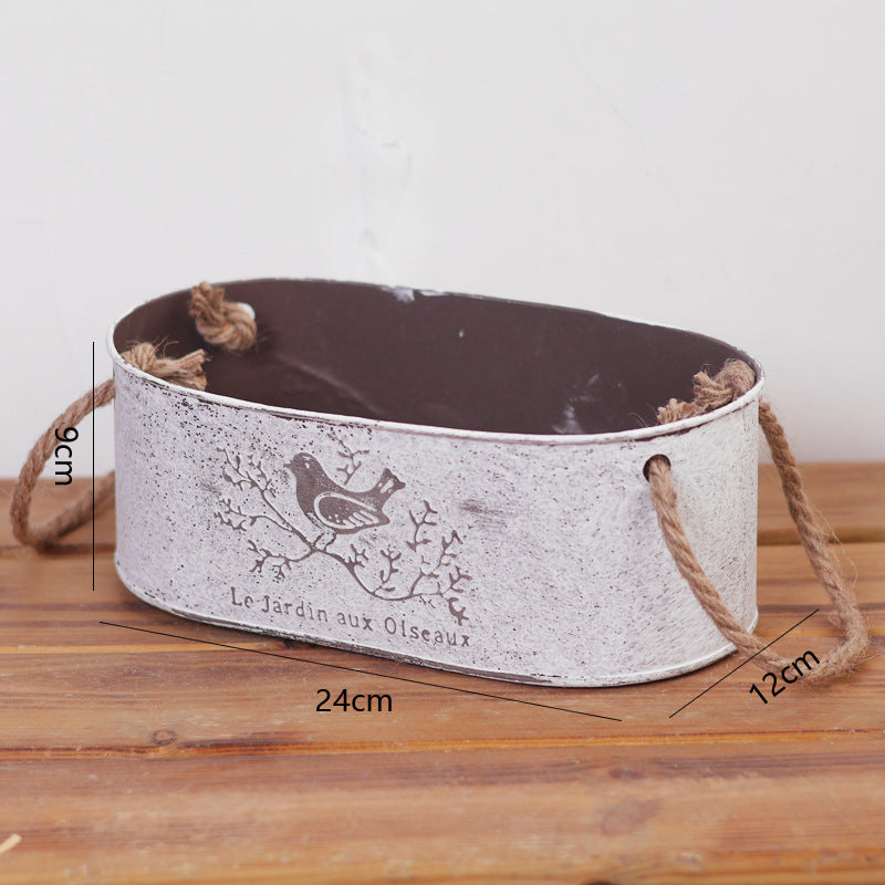 Decorative storage basket made of metal with natural design Bowlift