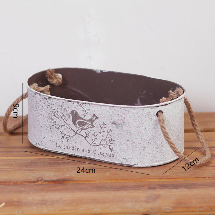 Decorative storage basket made of metal with natural design Bowlift