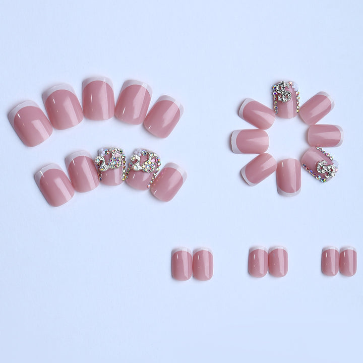 Premium artificial nails with sparkling 3D applications Bowlift