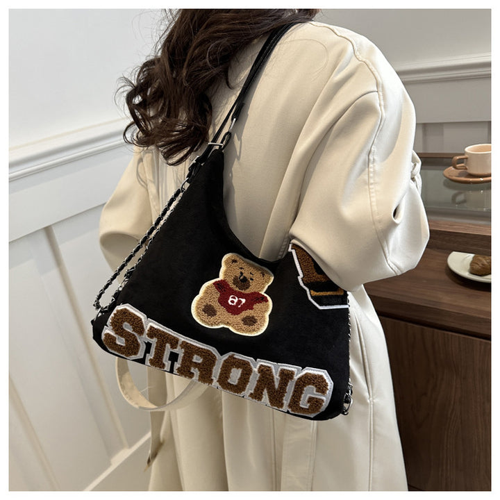 Shoulder bag in playful bear pattern Bowlift