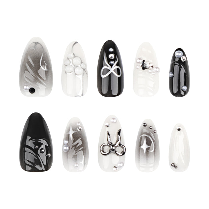 Elegant artificial nails with modern design and glitter accents Bowlift