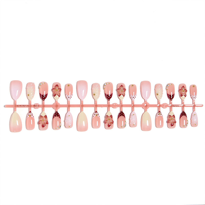 Elegant artificial nails set with floral accents Bowlift