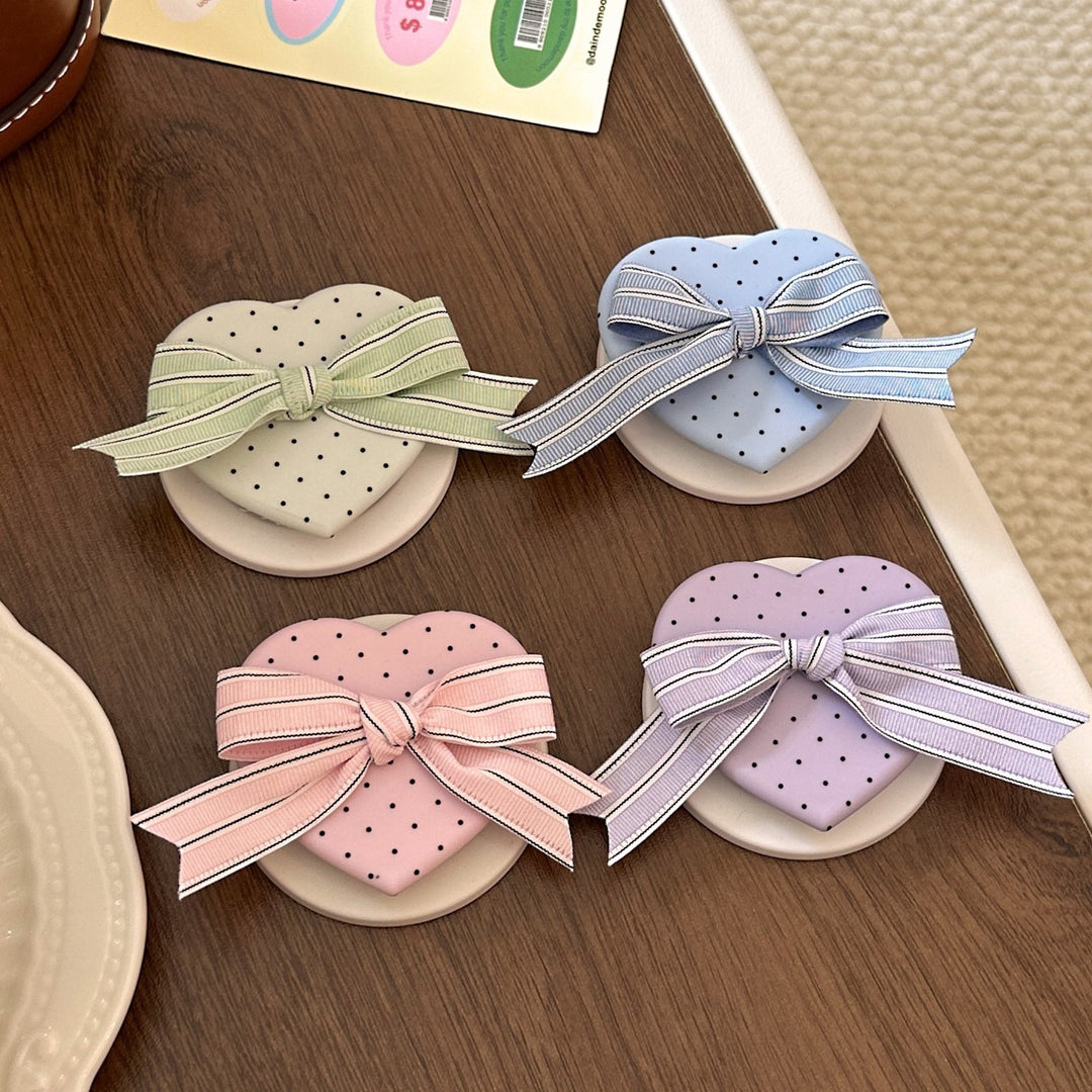 Heart-shaped cosmetic box with bow motif Bowlift