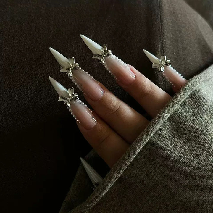 Elegant artificial nail set with 3D rhinestone details and pointed accents Bowlift