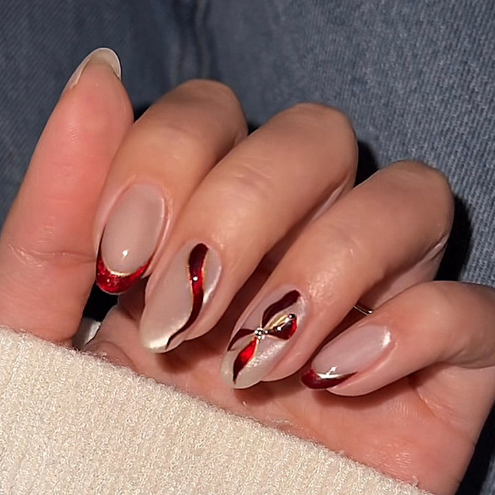 Acrylic nail set with elegant bow and glitter accents Bowlift