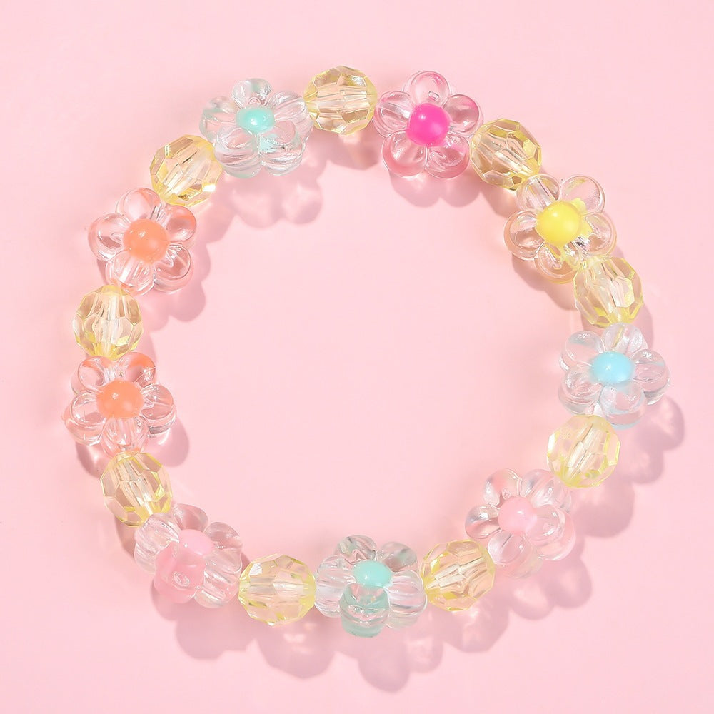 Friendship bracelet with colorful flower motifs Bowlift
