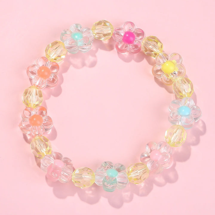 Friendship bracelet with colorful flower motifs Bowlift