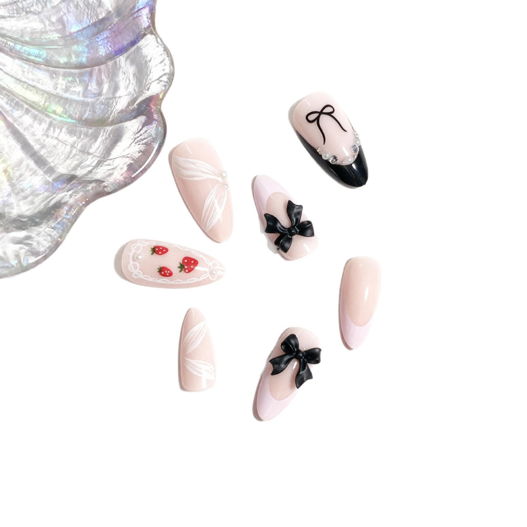 Artistic Press-On Nail Set with Bow and Berry Design Bowlift