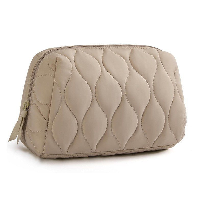 Cosmetic organizer bag with luxurious wave pattern Bowlift
