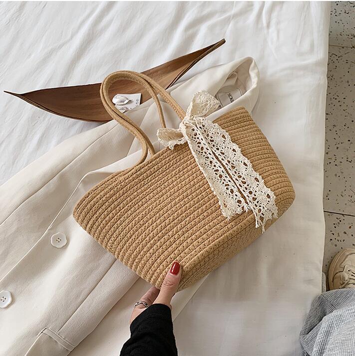 Handcrafted straw bag with lace accent Bowlift