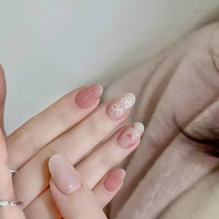 Artistic Press-On Nail Set with Floral and Glossy Accents Bowlift