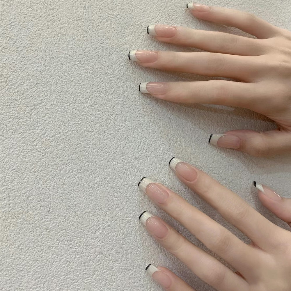 French Tip Press-On Nails with Elegant Black Detailing Bowlift