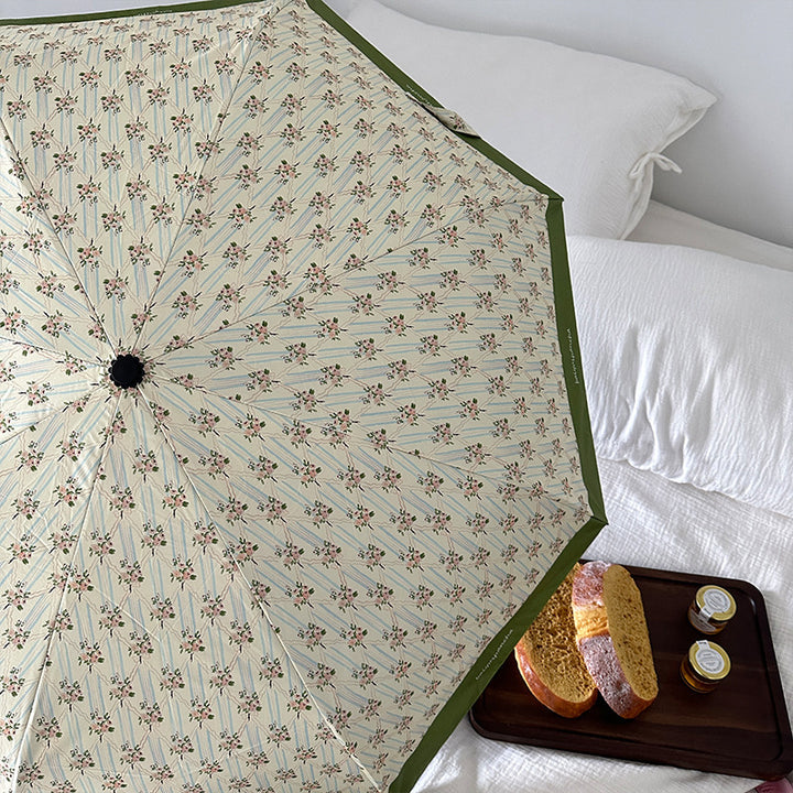 Ladies elegant folding umbrella with floral design Bowlift