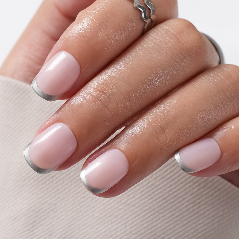 Artificial Nails in Natural French Tip Design Bowlift
