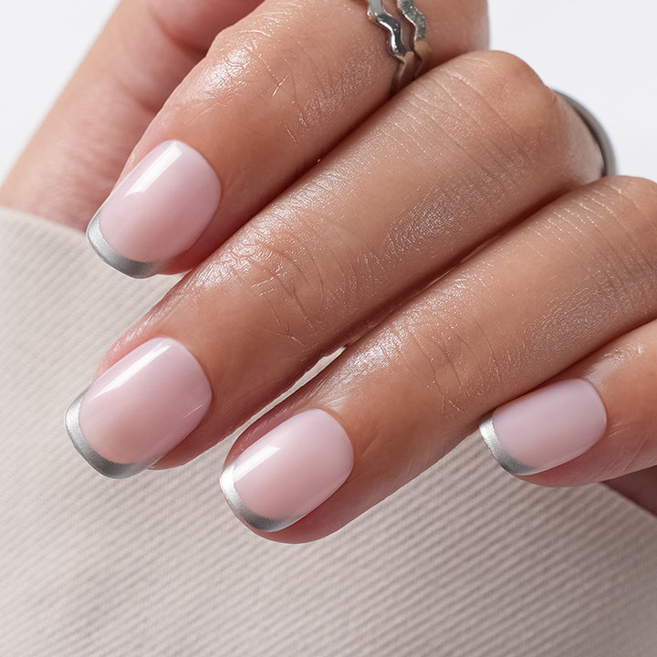Artificial Nails in Natural French Tip Design Bowlift